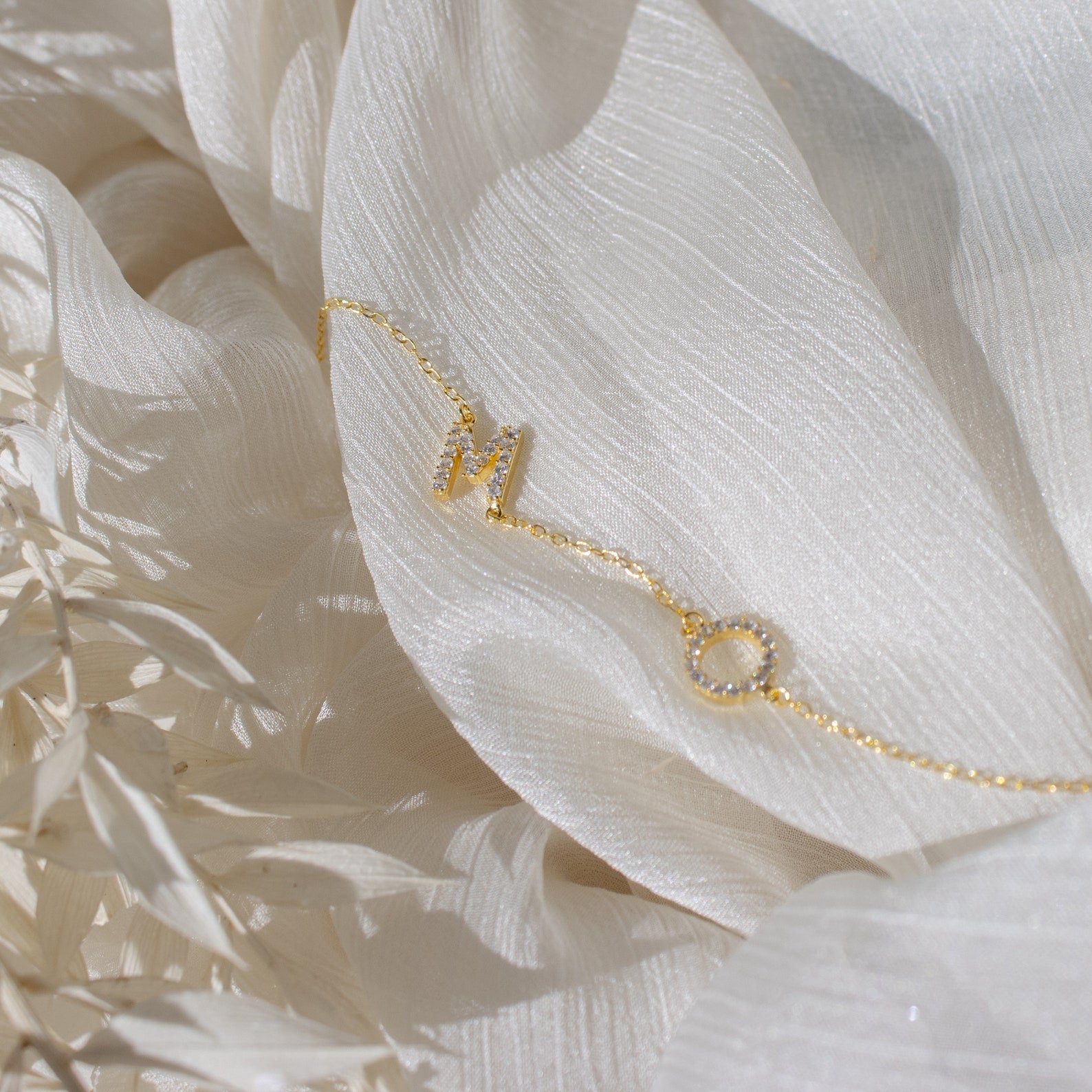 Elegant sideways letter necklace with sparkle